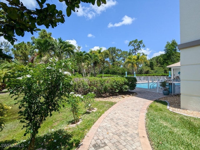 view of home's community with a pool