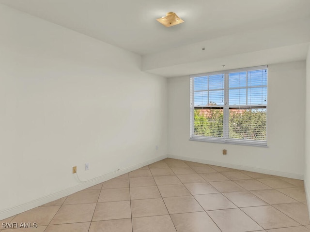 view of tiled spare room