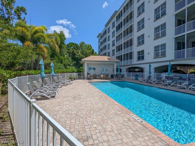 view of swimming pool featuring a patio