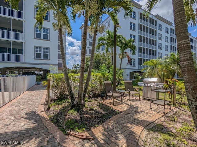 view of property's community featuring a patio area