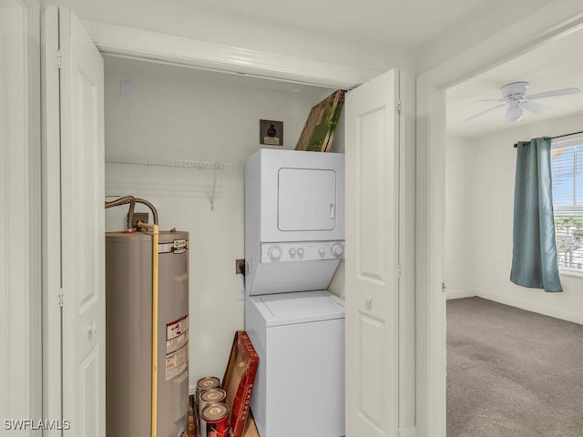 clothes washing area with light carpet, stacked washer / drying machine, electric water heater, and ceiling fan