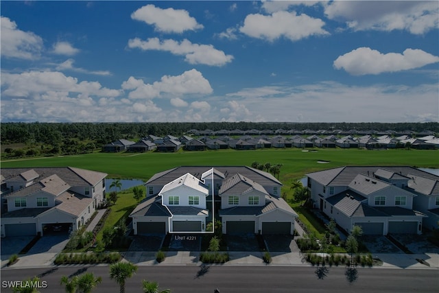 birds eye view of property with a residential view