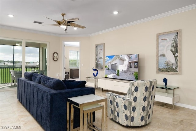 living room with ceiling fan and ornamental molding