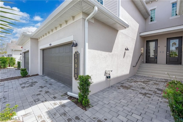 exterior space with a garage