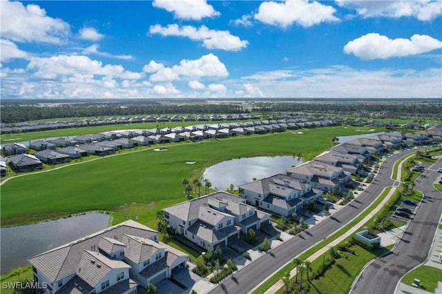 bird's eye view featuring view of golf course, a water view, and a residential view