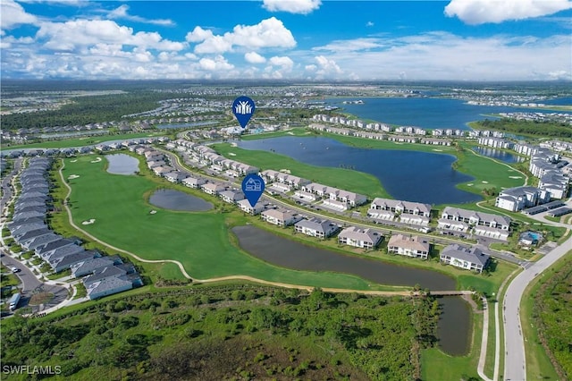 birds eye view of property featuring a water view and a residential view