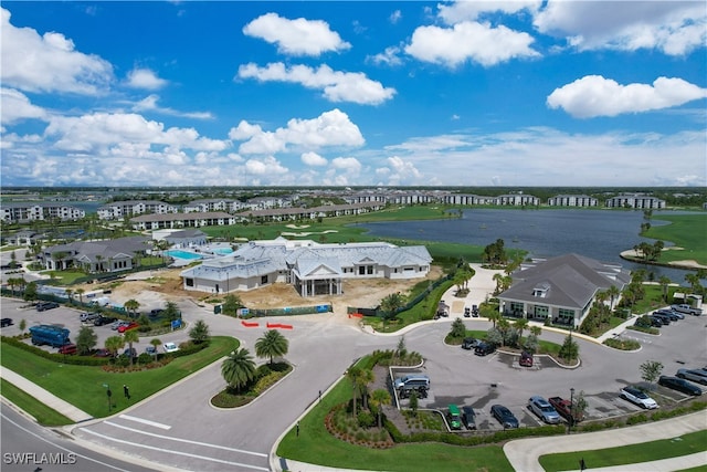 aerial view featuring a water view and a residential view