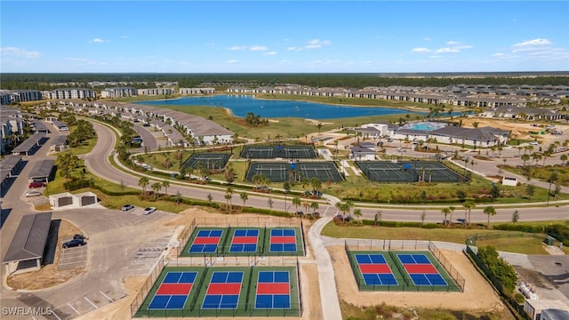 birds eye view of property featuring a water view