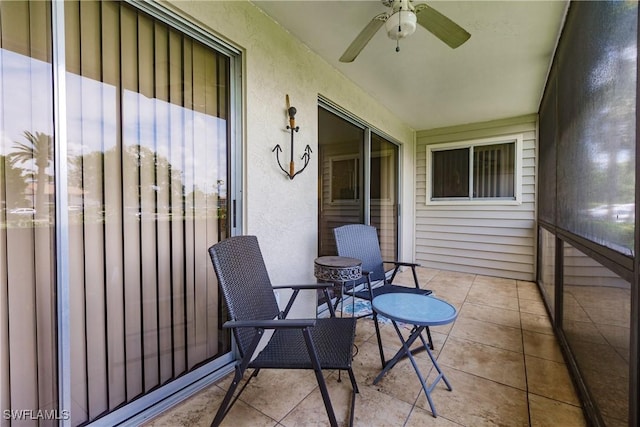 balcony featuring a ceiling fan