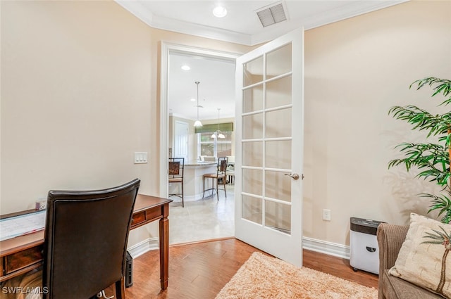 office area featuring crown molding, wood finished floors, baseboards, french doors, and recessed lighting