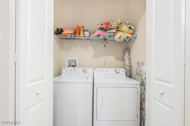 laundry area with washer and dryer