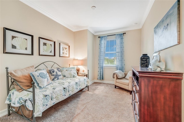 carpeted bedroom with crown molding and baseboards