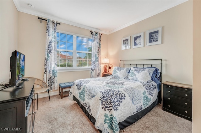 bedroom featuring crown molding and light carpet