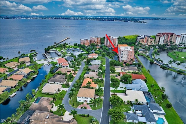 birds eye view of property featuring a water view