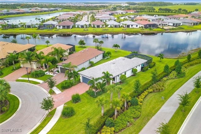 drone / aerial view featuring a water view