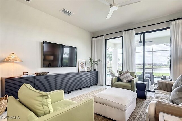 living room with ceiling fan