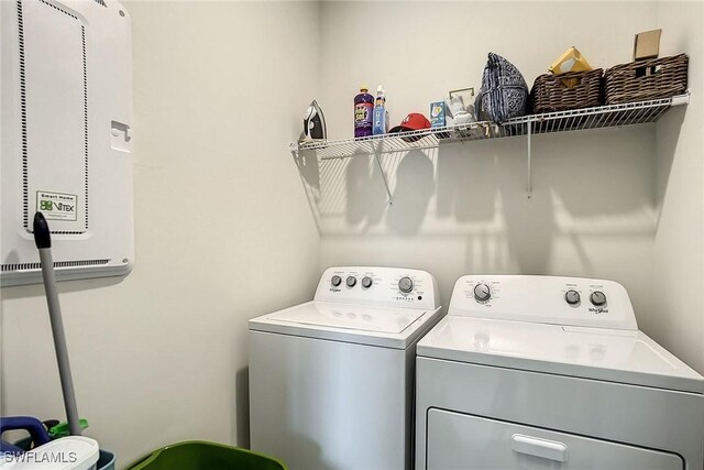 laundry area featuring washer and clothes dryer