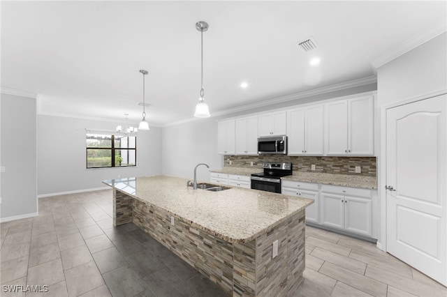 kitchen featuring white cabinetry, stainless steel appliances, and sink