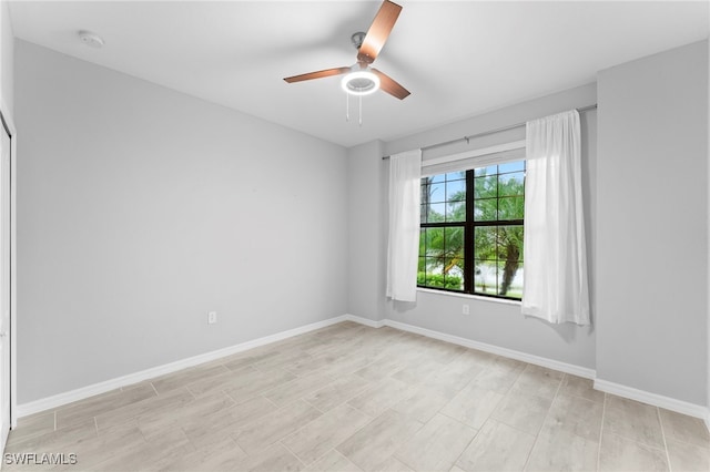 empty room featuring ceiling fan