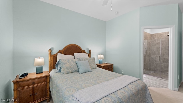 bedroom with connected bathroom, ceiling fan, and light hardwood / wood-style floors