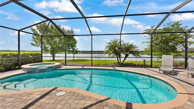 view of pool with a lanai, an in ground hot tub, and a patio