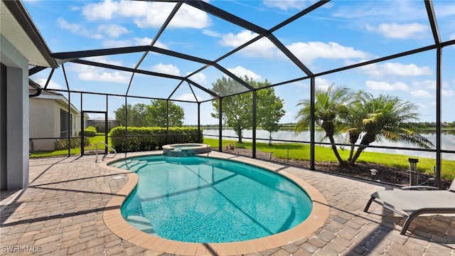 view of swimming pool with glass enclosure, an in ground hot tub, and a patio area