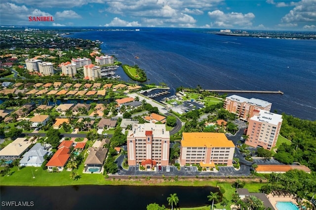 drone / aerial view with a water view