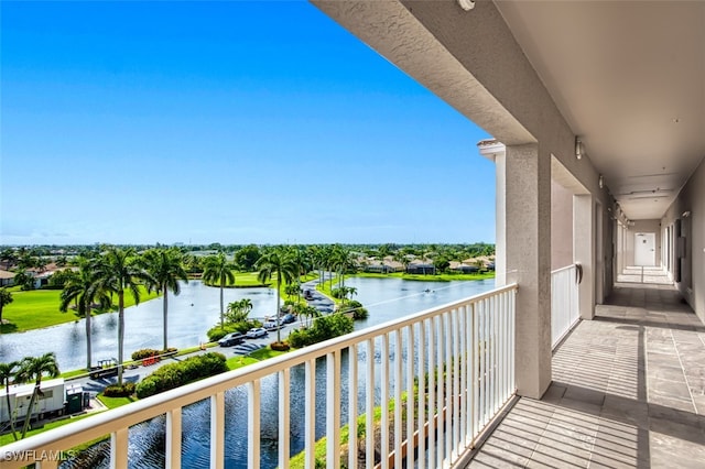 balcony featuring a water view