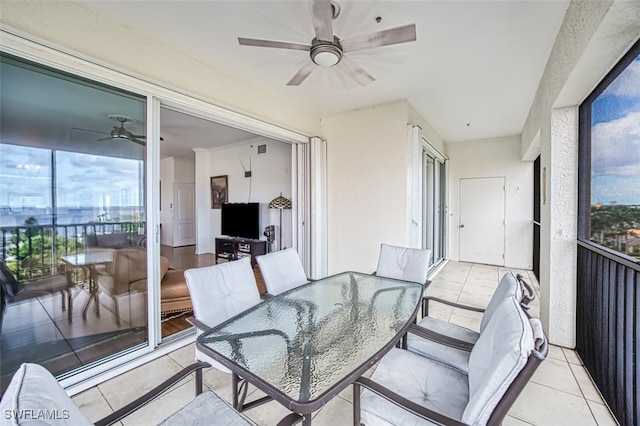 balcony featuring ceiling fan