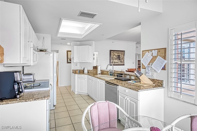 kitchen featuring stainless steel dishwasher, stone countertops, sink, and white cabinets