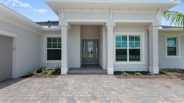 property entrance featuring a garage