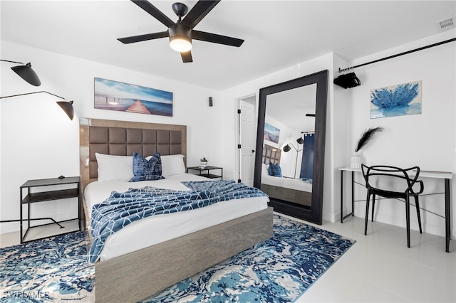 bedroom featuring tile patterned flooring and ceiling fan