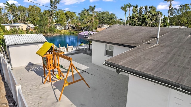 exterior space with a water view