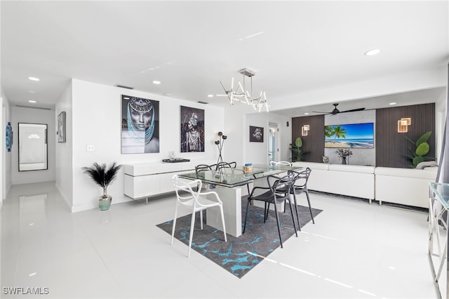 tiled dining room featuring ceiling fan