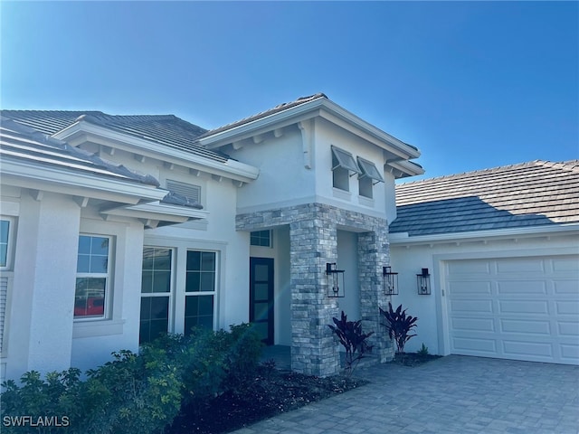 view of front of home with a garage