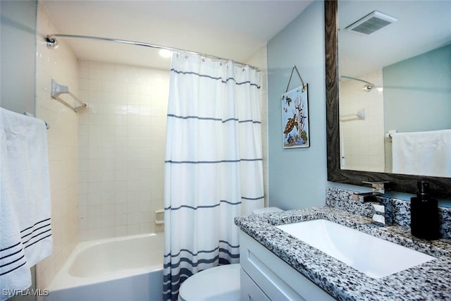 full bathroom featuring vanity, toilet, and shower / bath combo with shower curtain