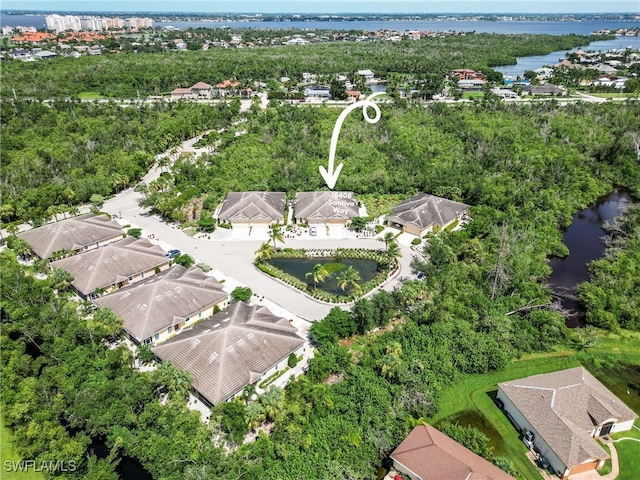 aerial view featuring a water view