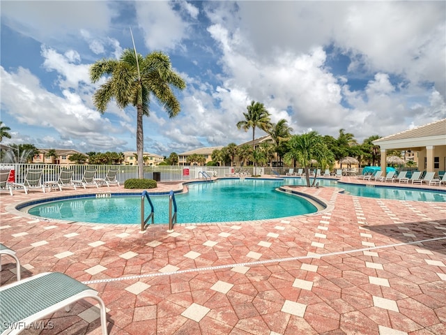 view of pool featuring a patio