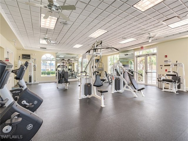 gym with a wealth of natural light and ceiling fan