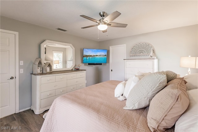 bedroom featuring ceiling fan and hardwood / wood-style flooring