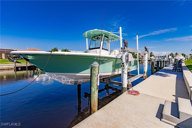 dock area with a water view