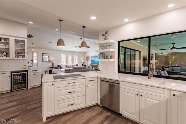 kitchen with dishwasher, sink, wine cooler, hanging light fixtures, and light stone counters