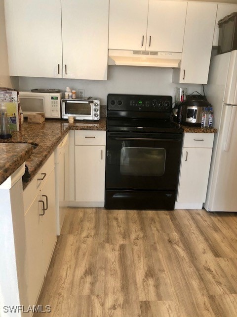 kitchen with white cabinetry, white fridge, black / electric stove, and light hardwood / wood-style floors