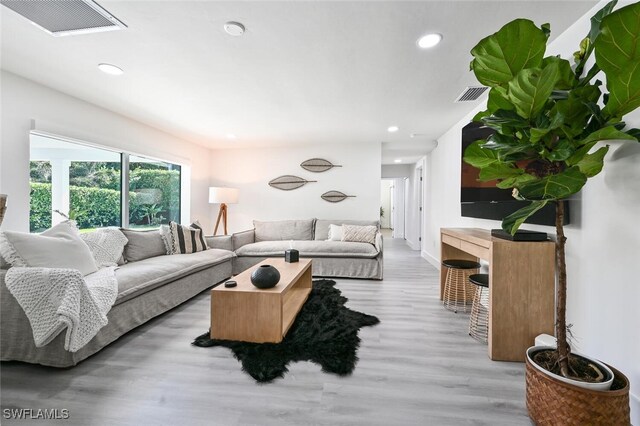 living room featuring hardwood / wood-style flooring