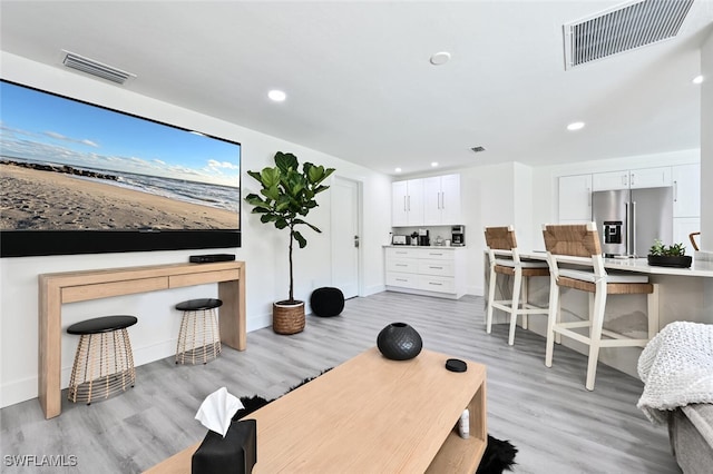 interior space with light hardwood / wood-style flooring