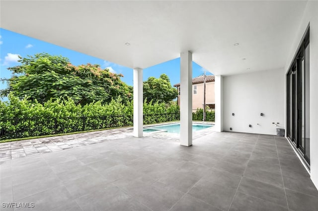 view of patio / terrace with an outdoor pool