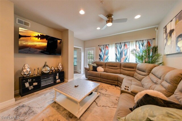 living room featuring ceiling fan