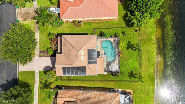 drone / aerial view with a water view