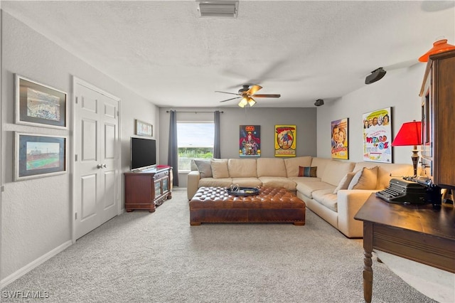 living room featuring ceiling fan, a textured ceiling, a textured wall, light carpet, and visible vents