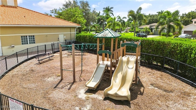 community play area featuring fence